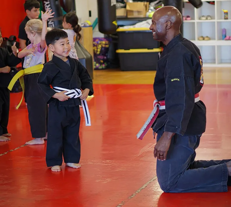 Children practicing karate at James Martial Arts Academy in El Cajon