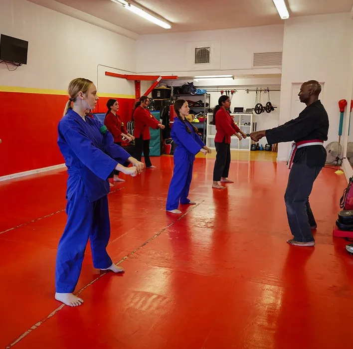 Kids building discipline and fitness through martial arts training at James Martial Arts Academy in El Cajon